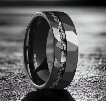 Tungstenenring. Inlegstukken van meteoriet. De energie van