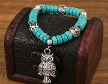 1 x Turquoise kleur kralen armband op elastiek met uil be..., Ophalen of Verzenden, Nieuw, Kraal