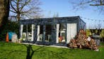 Uniek vakantiehuis! Energiebesparend & duurzaam!, Tuin en Terras, Tuinhuizen, Overige materialen, Nieuw, 400 cm of meer, 500 cm of meer