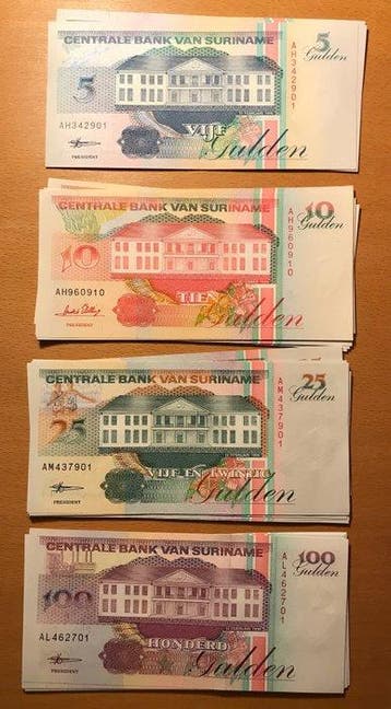 Suriname. - 20 x 5, 20 x 10, 20 x 25 and 20 x 100 Gulden