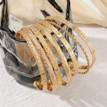 Set van 7 Gouden Punk Armbanden voor Dames - Streetwear & Go, Verzenden