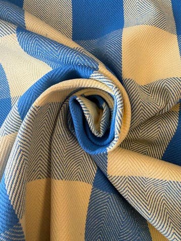 Stof met elegante visgraatbinding en een tweekleurig