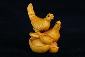 Absolute veiling - Paar kippen met nest netsuke -