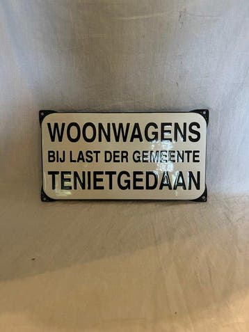 Emaille bord - woonwagens bij last der gemeente tenietgedaan