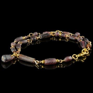 Oud-Romeins Bracelet, met draadgewikkelde paarse glazen