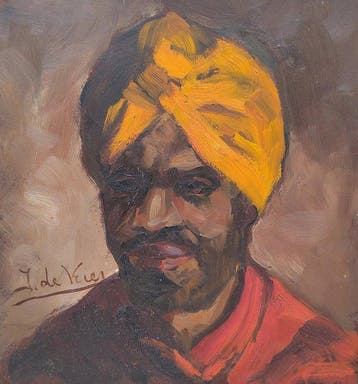 J. de Vries (XX) - Portret van een man met gele tulband