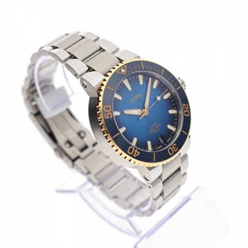 Oris Aquis Date 5-Days Cal. 400; 18k. Goud/Staal Heren..., Overige merken, Polshorloge, Overige materialen, Ophalen of Verzenden