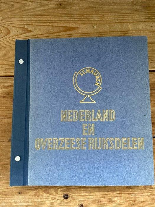 Overzeese Rijksdelen 1864/1979 - Schaubek album Overzee, Postzegels en Munten, Postzegels | Nederland
