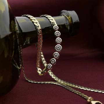 Gouden platte gourmet schakelcollier met diamant 0,50 ct., Sieraden, Tassen en Uiterlijk, Gebruikt, Ophalen of Verzenden, Met edelsteen