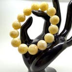Armband met witte Baltische barnsteen kralen 15 mm 31,9 g -