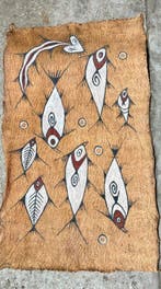 Kostbare Tapi-stof gebruikt als dansschorten in Sentani. -