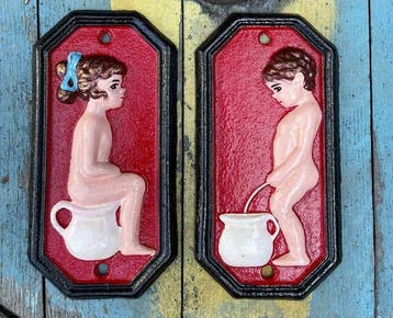 Decoratief ornament (2) - Set van twee gietijzeren