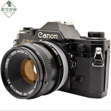 Canon AE-1 + FD 1.8/50mm S.C. Single lens reflex camera, Audio, Tv en Foto, Fotocamera's Analoog, Nieuw