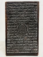 Tibetaanse boeddhistische houten drukblok met reliëf van een