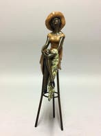 Beeld, Vrouw in de zon - 28 cm - Brons