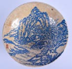 Een Chinese aardewerken blauwe emaille ronde kom uit de