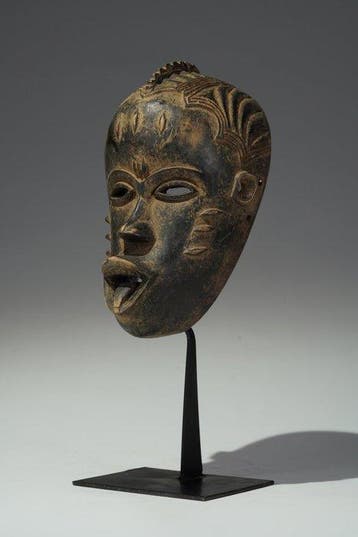 Een houten masker - Guro - Ivoorkust (Zonder minimumprijs)