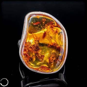 Exclusieve barnstenen ring – warme elegantie met oeroude