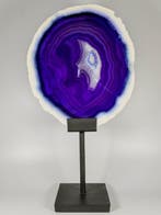 Very deep purple agate slice with white edges on stand