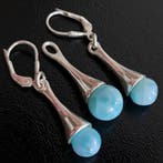 Larimar. Set van hanger en oorbellen met beveiligde