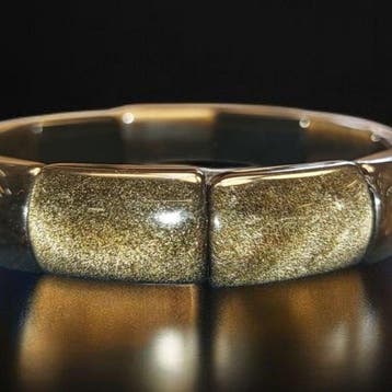 Hoogwaardige gouden obsidiaan-armband. Zeer heldere