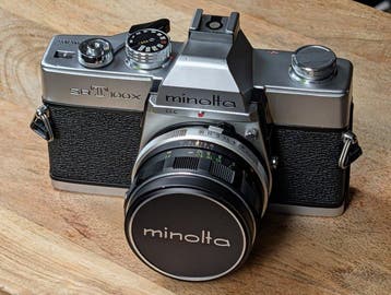 Minolta SRT 100 x + MC Rokkor PF 1,7/55mm Single lens reflex, Nieuw
