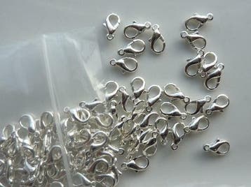 100 stuks karabijnersluitingen 12mm zilverkleur - GOEDKOOP!, Ophalen of Verzenden, Nieuw, Overige typen
