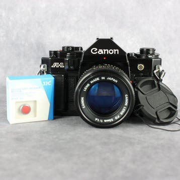 Canon A-1 + FD 1,4/50mm | Single lens reflex camera (SLR), Audio, Tv en Foto, Nieuw