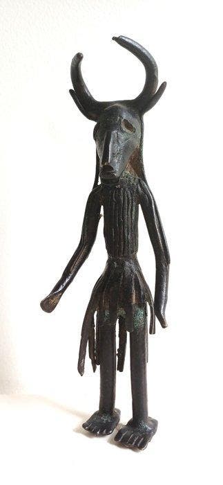 Bronzen fetisj van een man met een hertenhoofd - Yoruba -