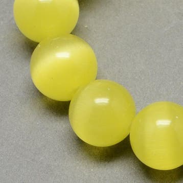 20 x Cateye glas kralen 6mm geel rijg gat: 1mm (Glaskralen), Ophalen of Verzenden, Nieuw, Kraal