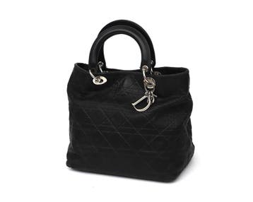Een zwarte Christian Dior handtas, Gebruikt