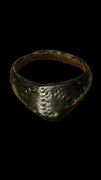 Bronzen boogschuttersduimring (Zihgir) uit de