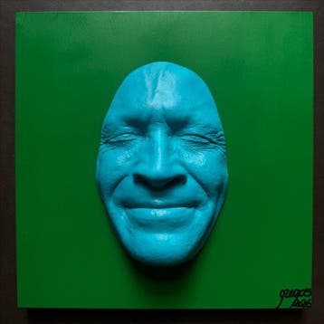 gregos - Blue light smile on green background