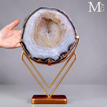 Gepolijste agatgeode-schijf Elegante display-slice op een, Verzamelen
