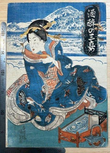 Utagawa Kunisada – Woman with Sake Utensils, from Three