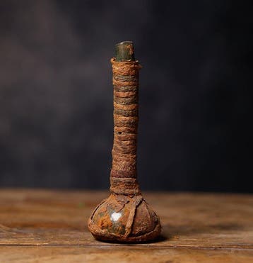 Oud-Romeins Glas gewikkeld in textiel met Spaanse
