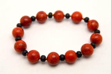 Koraal - Fijn rode koraal ronde kralen 10 mm armband -