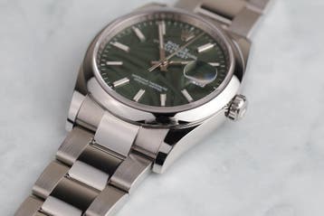 Rolex Datejust 126200 - Palm motif dial - 2023, Staal, Gebruikt, Polshorloge, Ophalen of Verzenden