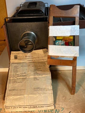 Historische bioscoop-reclameprojector met originele, Verzamelen