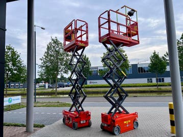 Kleine Elektrische Schaarhoogwerker – Compact en Lithium, Zakelijke goederen, Machines en Bouw | Liften, Steigers en Ladders, Verzenden