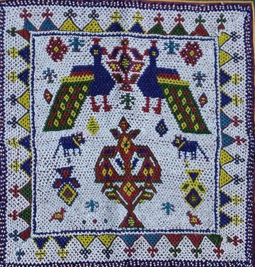 Traditionele decoratie van textiel en kralen gemaakt door de