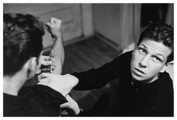 Larry Clark (1943–) - Billy Mann holding Timmy Tarrs arm
