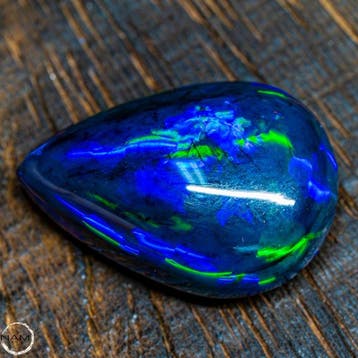 Grote eerste kwaliteit zwarte opaal cabochon 21,15 ct- 4.23