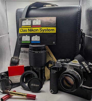 Nikon FE + MD-1 + 2 Objektive + Zubehör | Analoge camera, Nieuw