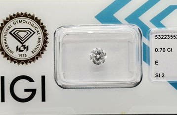 1 pcs Diamant (Natuurlijk) - 0.70 ct - Rond - E - SI2 -, Nieuw