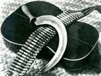 Tina Modotti (1896–1942) - Guitar, Cartridge Belt and Sickle