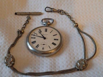 Gelamineerd zilveren Zakhorloge 2e helft 20e eeuw naam op, Antiek en Kunst
