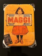 Maggi–reclamebord van geglazuurd ijzer, de beroemde reclame