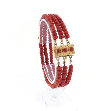Antieke bloedkoraal kralen armband met gouden slot., Gebruikt, Ophalen of Verzenden, Met edelsteen, Goud
