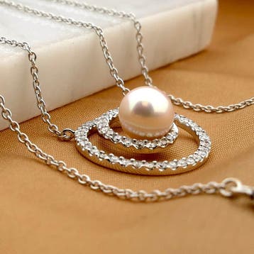 Witgouden collier met Tahiti parel en diamanten; 0,80 ct., Gebruikt, Ophalen of Verzenden, Met edelsteen, Goud